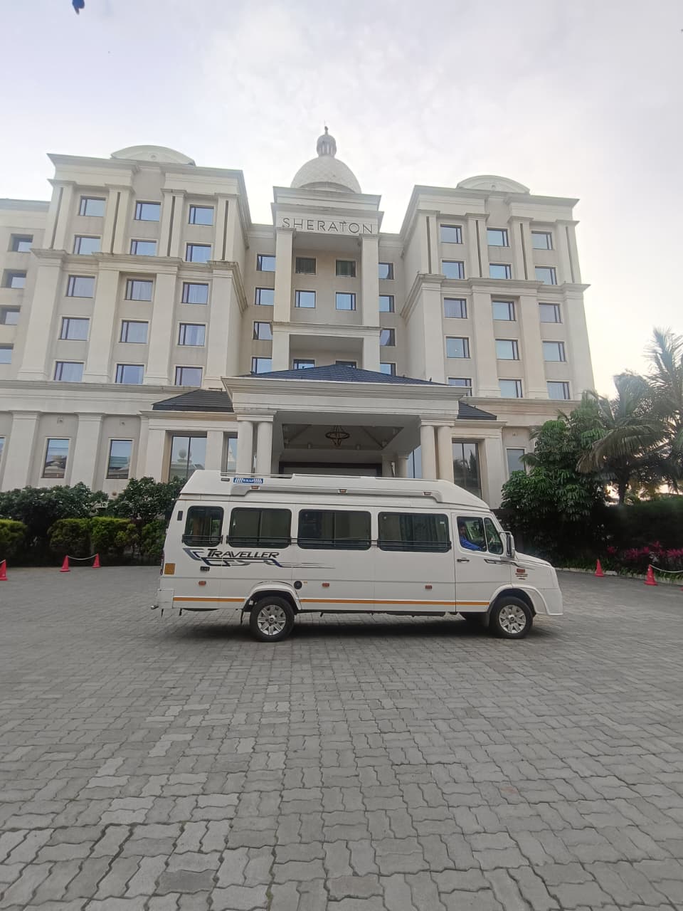 IndoreCab tempo traveller on a hotel pickup